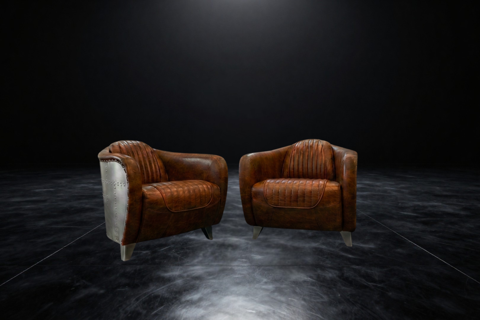 Paire de fauteuils aviateur en cuir et aluminium
